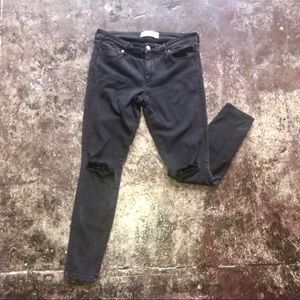 Black, hole-in-the-knee A&F Jeans
